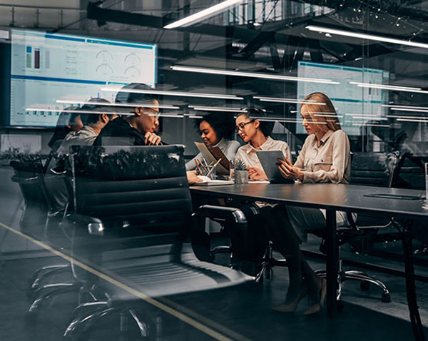 A group of people sitting at a table