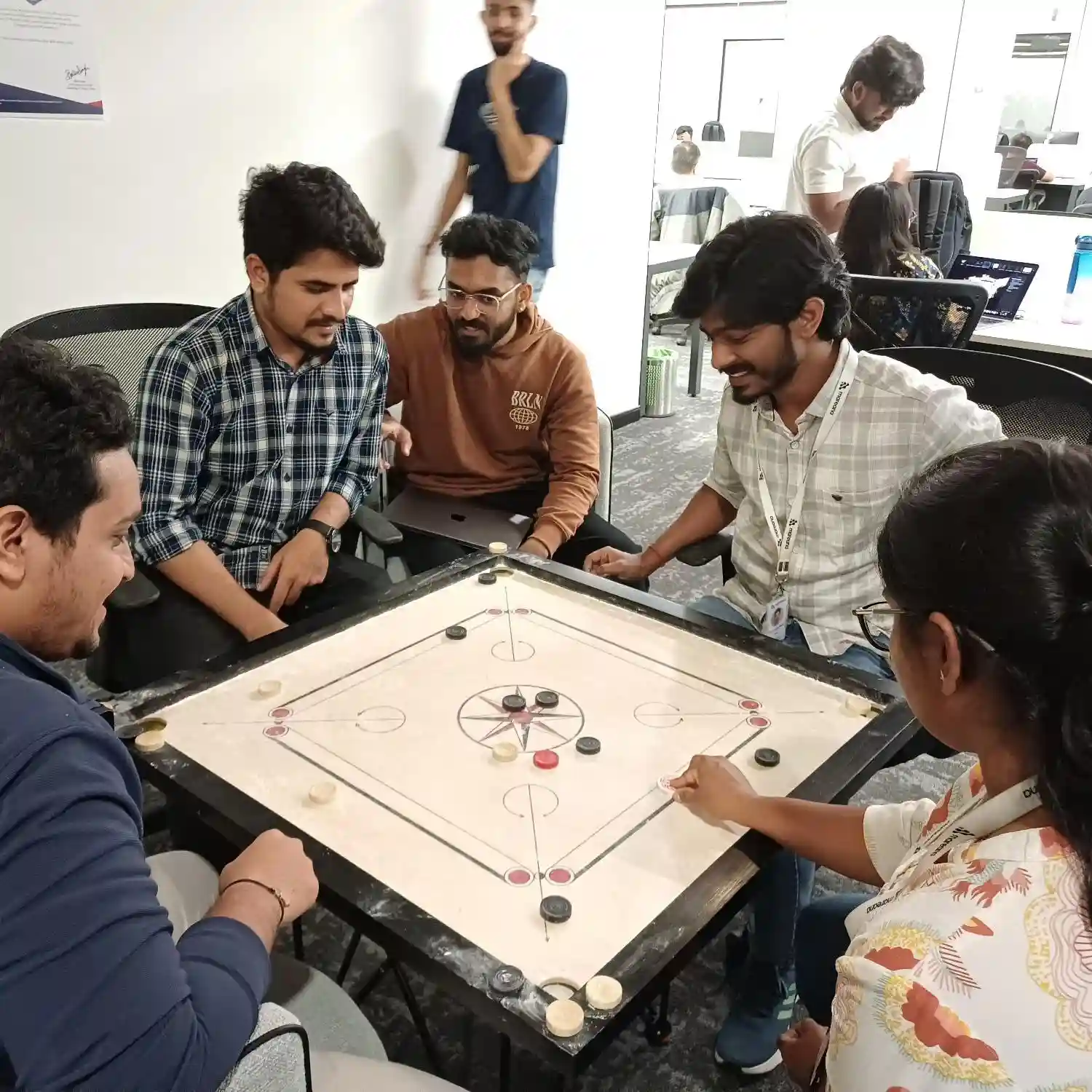 A carrom competition between colleagues