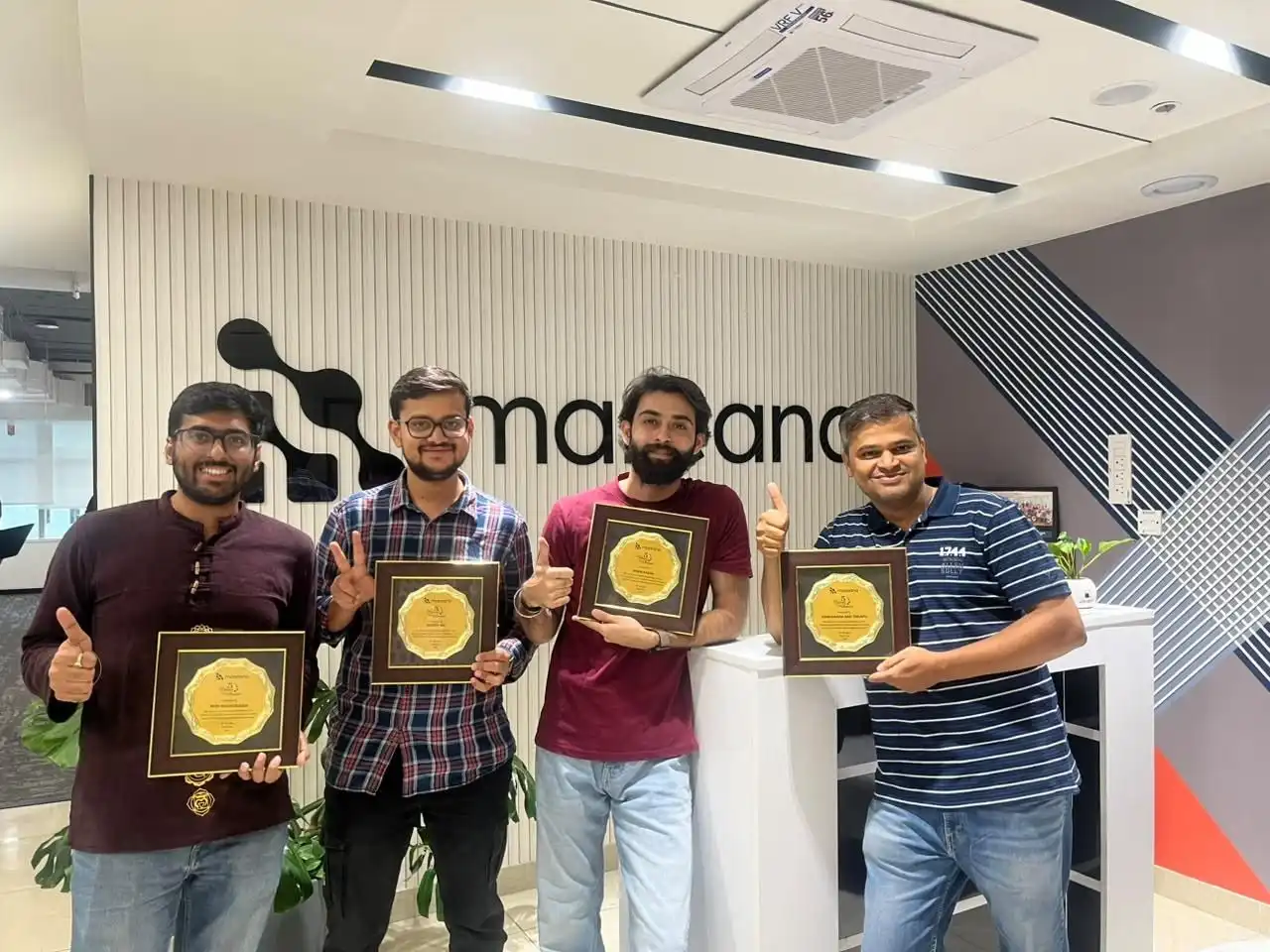 Colleagues celebrating five-year work anniversaries
