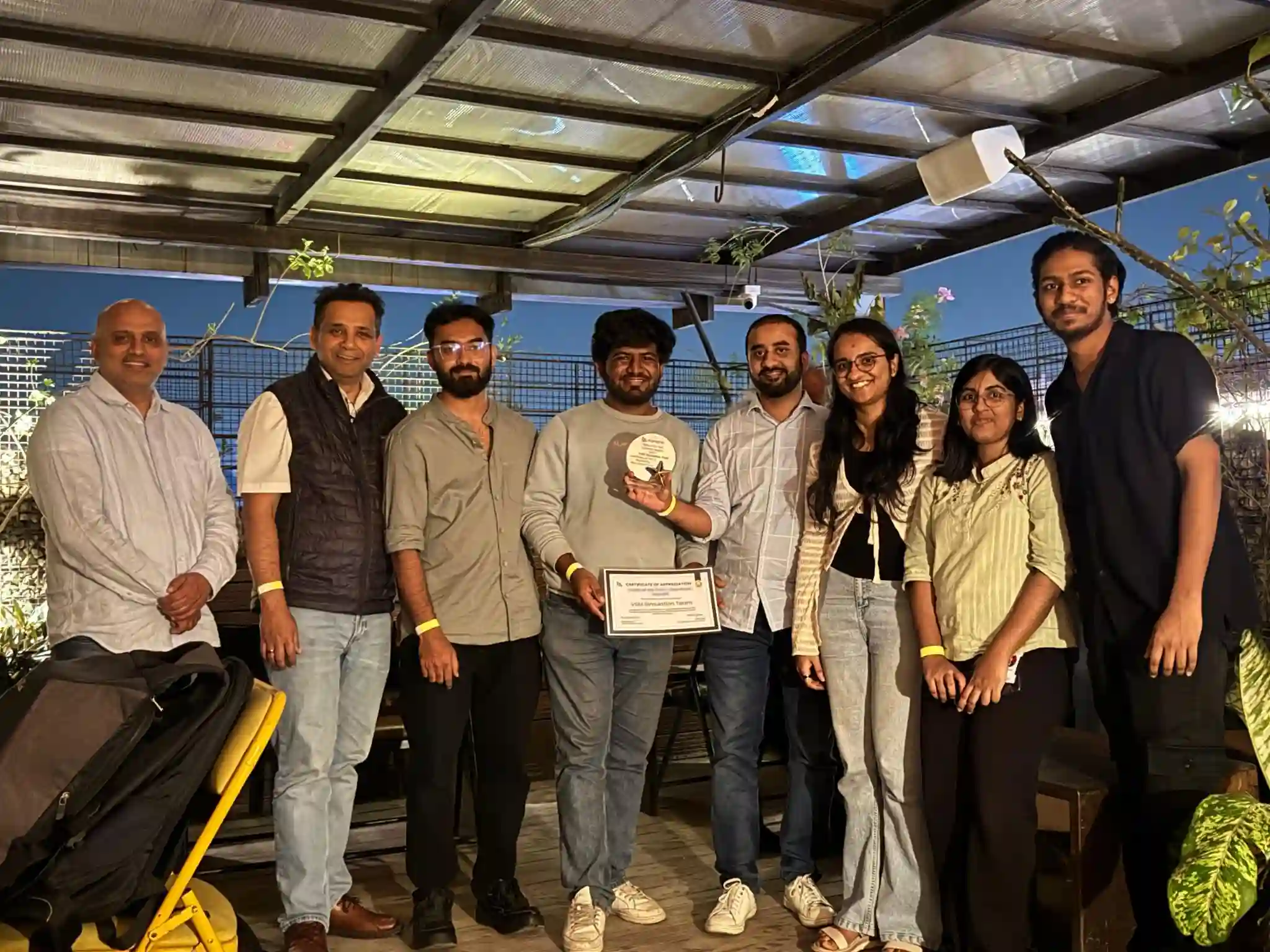 An employee being recognised in front of the team